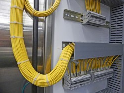 yellow wiring inside of a control panel